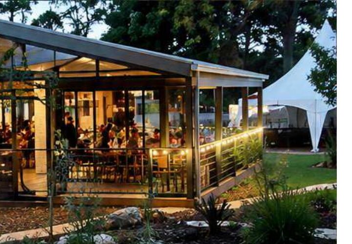Little Grots Farm Kindy cubby caf&eacute; at dusk, built by Vesara